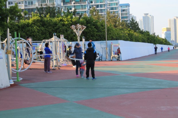 On our way back for dinner we passed one of the outdoor gyms and I saw people using some of those giant hula hoops I'd seen on my hike last weekend. Blurry picture, but I was pretty excited.